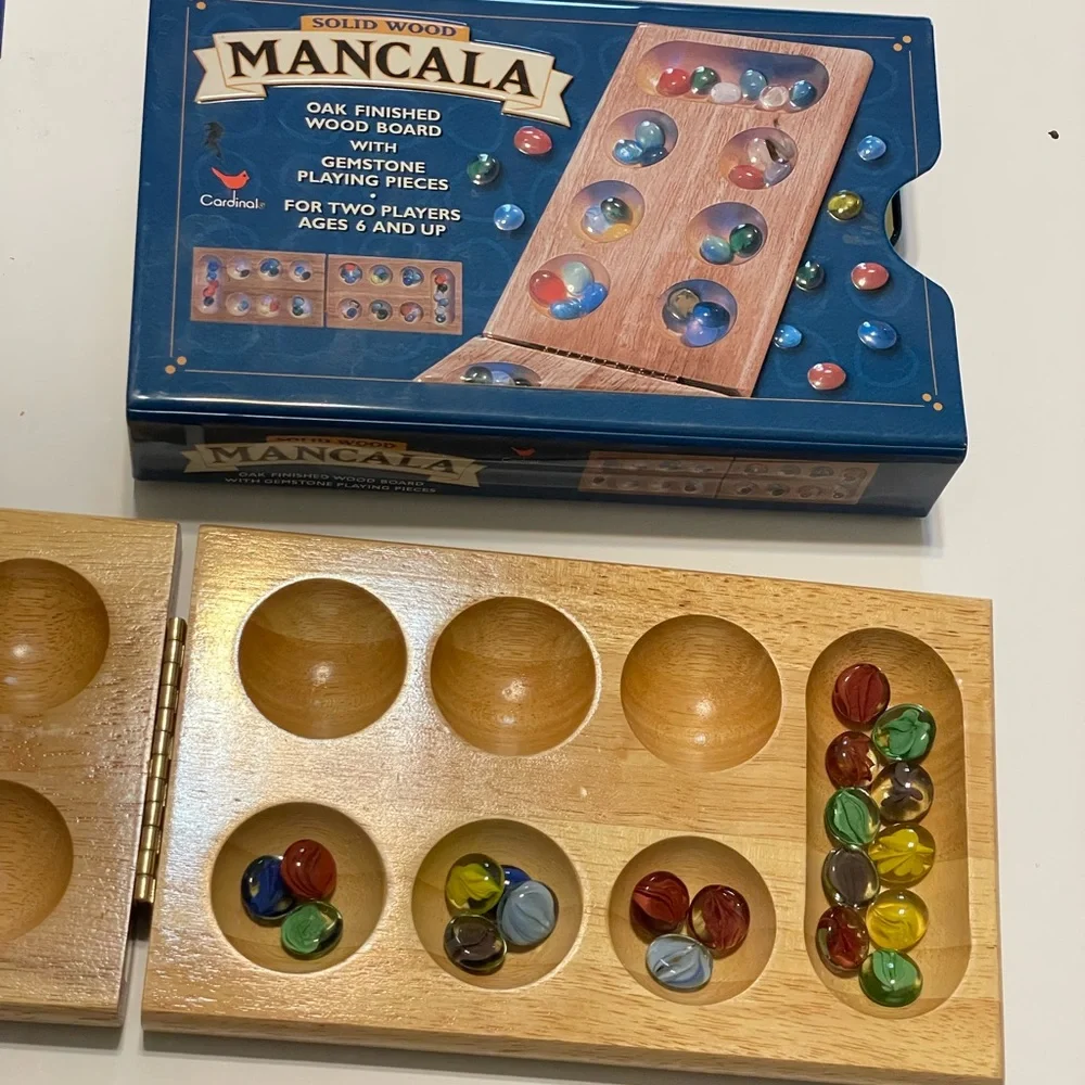 Folding Wooden Mancala Game with Colorful Stones In Metal Box